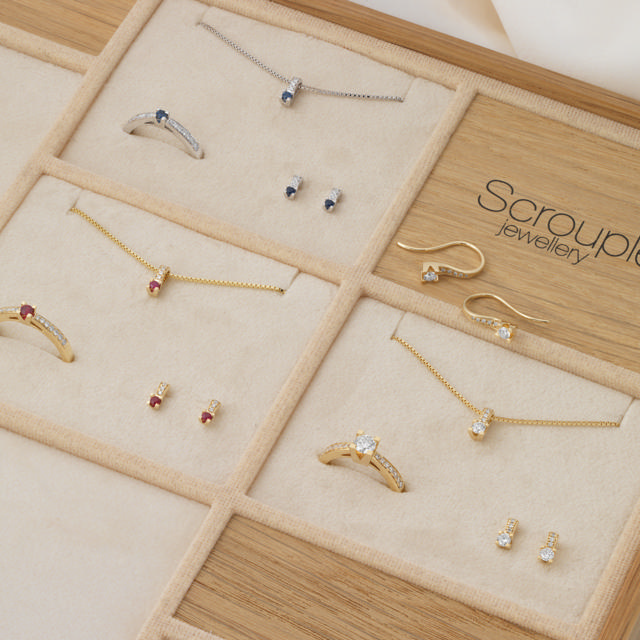 Earring ruby+0,03 H-W/SI 585 yell.