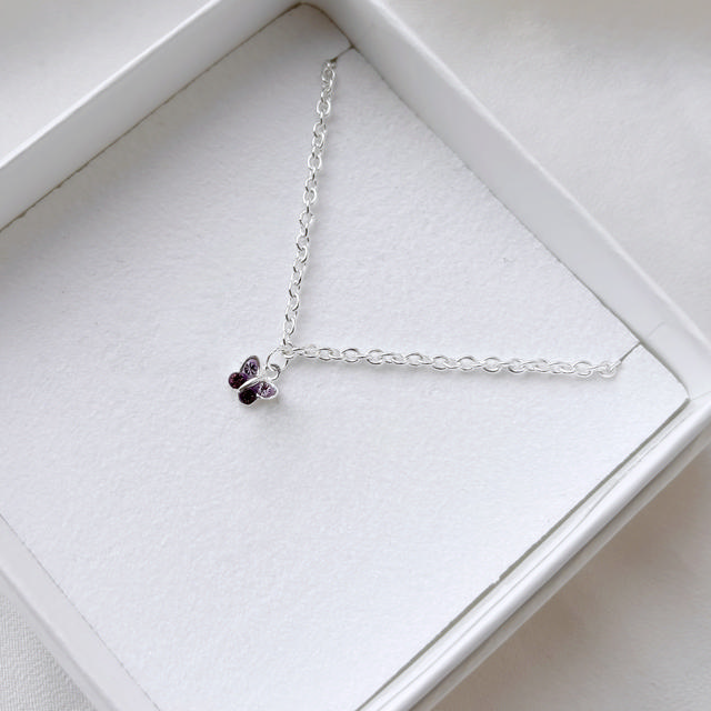 *Girls armbånd sommerfugl lilla  cubic zir. sølv