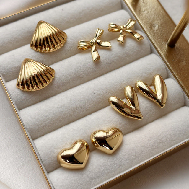 Earsticks shell steel goldplated